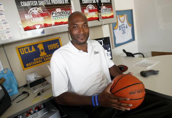  In this photo taken Saturday, Sept. 18, 2010, former UCLA basketball player Ed O'Bannon is pictured at his office at Findlay Toyota.