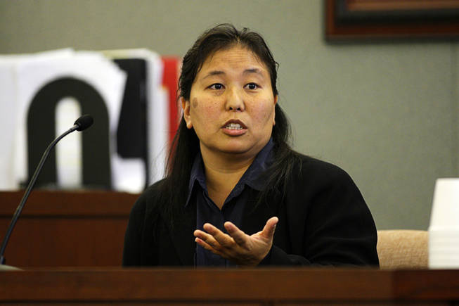 Jody Okawaki, a special agent with the U.S. Secret Service, testifies during a coroner's inquest at the Regional Justice Center Thursday, September 23, 2010. 