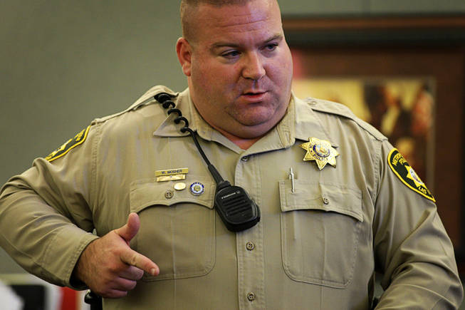 Metro Police Officer William Mosher testifies for a second day during a coroner's inquest for Erik Scott at the Regional Justice Center Friday, September 24, 2010. 