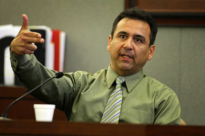 Costco assistant manager Vince Lopez testifies during a coroner's inquest for Erik Scott at the Regional Justice Center Friday, September 24, 2010. Lopez said Scott made what he perceived as a threatening gesture.