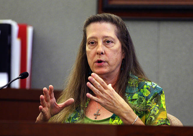 Arlene Houghton, a Costco cashier, testifies during a coroner's inquest for Erik Scott at the Regional Justice Center Friday, September 24, 2010.