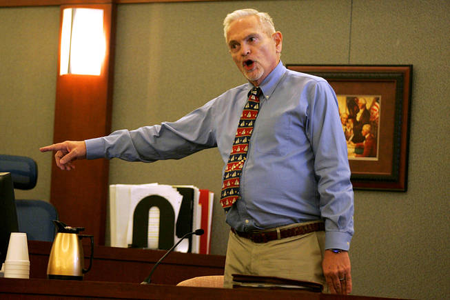 John Cooper testifies during a coroner's inquest for Erik Scott at the Regional Justice Center Saturday, September 25, 2010.