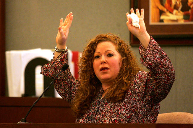 Costco customer Wendy Wolkenstein testifies during a coroner's inquest for Erik Scott at the Regional Justice Center Saturday, September 25, 2010.