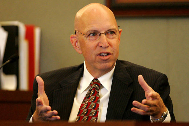 Costco shopper Dr. Edward Fishman testifies during a coroner's inquest for Erik Scott at the Regional Justice Center Saturday, September 25, 2010.