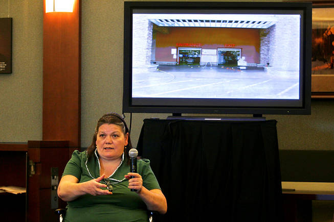 Costco shopper Dolly Rand testifies during a coroner's inquest for Erik Scott at the Regional Justice Center Saturday, September 25, 2010.