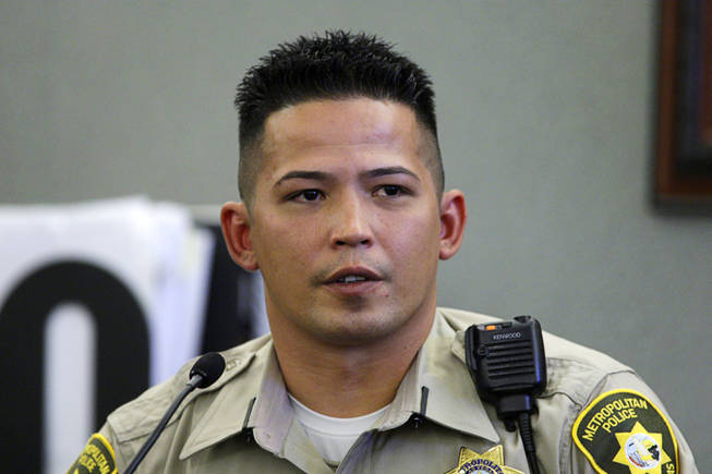 Metro Police Officer Thomas Mendiola testifies during a coroner's inquest for Erik Scott at the Regional Justice Center Tuesday, September 28, 2010. 