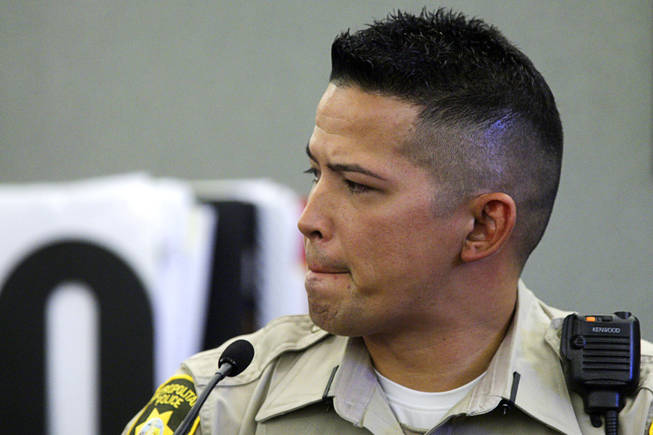Metro Police Officer Thomas Mendiola testifies during a coroner's inquest for Erik Scott at the Regional Justice Center on Sept. 28, 2010. Scott was shot and killed by Metro officers at the Summerlin Costco store July 10.