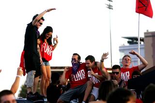 UNLV fans tailgate before Saturday's football game against UNR.