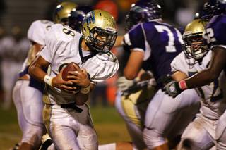 Foothill High School's Miles Killebrew (28) carries the ball during a game at Silverado Friday, October 8, 2010. Foothill won the game 13-7.