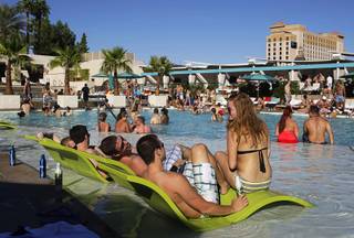 Sunbathers enjoy the afternoon at the Wet Republic pool at the MGM Grand Friday, October 8, 2010.