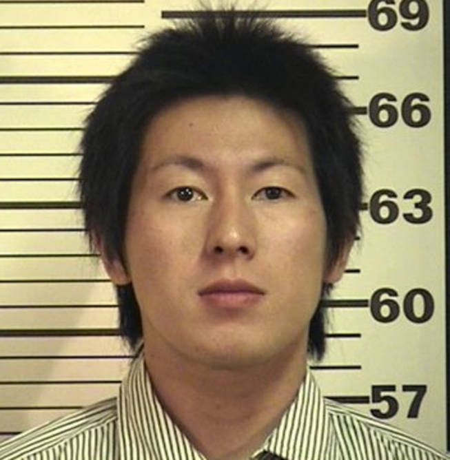 In this booking photo released by Iron County Jail in Cedar City, Utah showing Japanese citizen 26-year-old Yasushi Mikuni who was arrested Tuesday. Mikuni was driving the tour bus that crashed in Utah, killing three people and injuring 11 others from a Japanese tour group last month is accused of having trace amounts of an intoxicant in his blood.