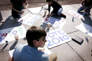 volunteers prepare signs for the rally with President Obama at Orr Middle School in Las Vegas Thursday, October 21, 2010.