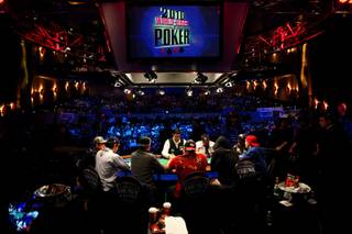The final table of nine players at the World Series of Poker Main Event play for the $9 million first place prize and the world championship bracelet at the Penn & Teller Theater in the Rio Saturday afternoon.