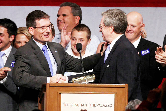Rep.-elect Joe Heck shakes hands with former Gov. Bob List on Tuesday at the Venetian. Of his voting decisions in Congress, Heck said, "If this is going to be something that's going to be good for my children, then I think it's probably going to be good for most Americans."