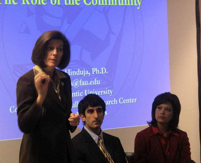Nevada Attorney General Catherine Cortez-Masto speaks during a cyberbullying panel held at Paseo Verde Library Wednesday night. Dr. Sameer Hinduja (middle) was the keynote speaker and informed the crowd on ways to prevent cyberbullying.