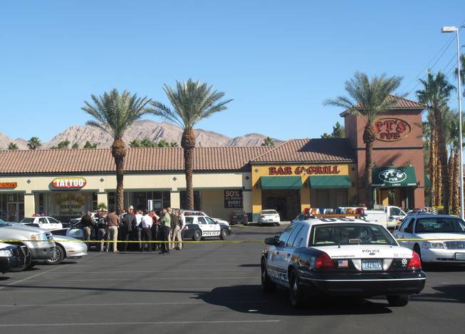 A 23-year-old man was shot by three Metro Police officers this morning after he took a bartender hostage at knifepoint during a robbery and refused officers' verbal commands. He later died at the hospital. The incident occurred at PT's Pub located at 2280 S. Nellis Blvd.