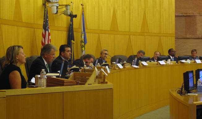 A nine-member panel meets Oct. 18 in the Clark County Commission chambers to discuss the coroner's inquest process and listen to public feedback. From left are Margaret McLetchie, Bill Maupin, John Fudenberg, David Roger, Christopher Blakesley, Doug Gillespie, Phil Kohn, Richard Boulware and Chris Collins.