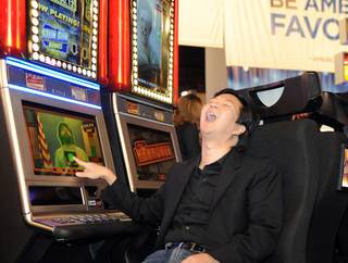 Hangover star Ken Jeong debuts IGT's slot machine based on the blockbuster movie at Global Gaming Expo (G2E) 2010 at the Las Vegas Convention Center on Nov. 16, 2010.