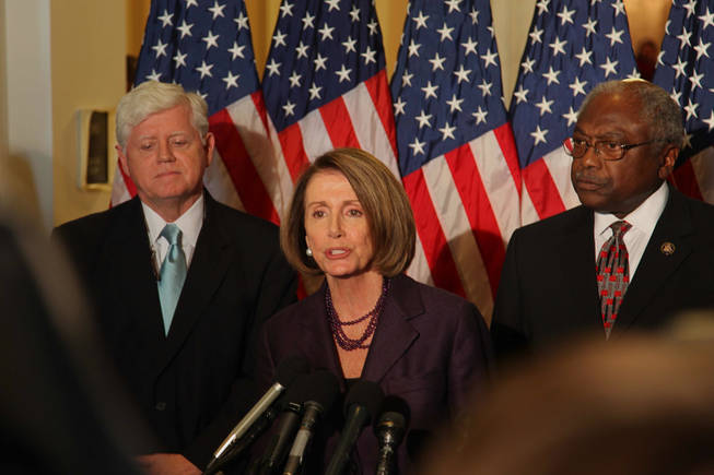 Speaker Nancy Pelosi addresses reporters at a news conference following her re-election to the House Democrats' top post in the Cannon House Office Building Wednesday afternoon. Pelosi will serve as minority leader in the 112th Congress, a position currently held by John Boehner.