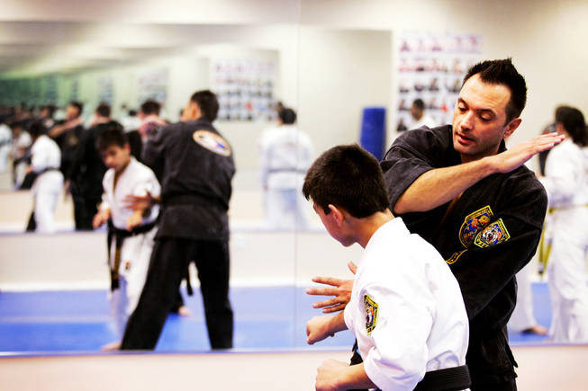 Vladimir Mialovski teaches a martial arts class inside his studio in Las Vegas November 18, 2010.