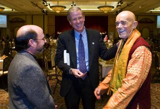 Father Ron Zanoni, left, pastor of St. Christopher Catholic church in North Las Vegas,  Gard Jameson, center, associate pastor of the Grace Community Church in Boulder City, and Swami Ramananda of the Hindu Society of Nevada, chat before the Mayors Prayer Breakfast, an event that is supposed to develop leadership skills in Las Vegas' youth, at Texas Station Thursday, November 18, 2010. The event modeled after the National Prayer Breakfast in Washington, D.C.
