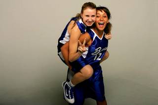 Basic basketball players Kelsey Gunther and Kailai Brantner