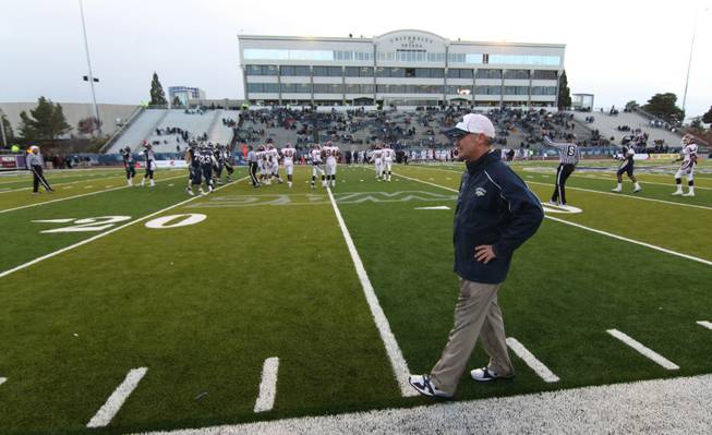 Nevada Head Coach Chris Ault walks the sidelines in the final minutes of Saturday's NCAA football game agaist New Mexico State on Nov. 20, 2010 in Reno, Nev. The 52-6 victory was Nevada's 500th win. 