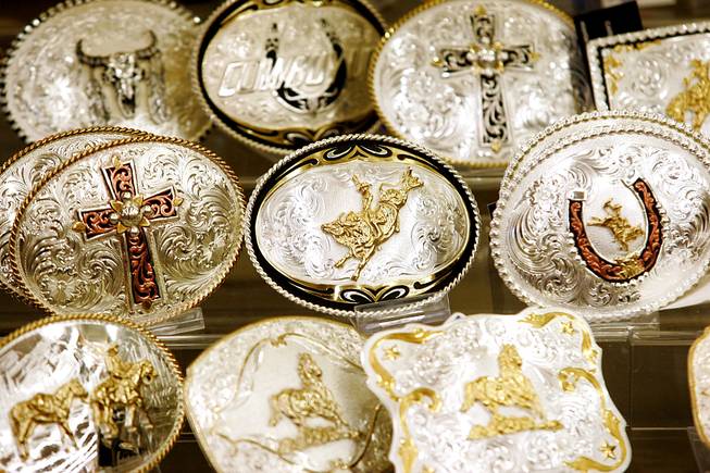 Belt buckles on display at the Boot Barn on Wednesday, Nov. 24, 2010.