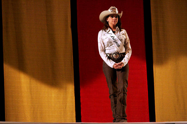Miss Rodeo Arizona Kasey Jo Painter waits for her cue as she rehearses for the Miss Rodeo America Pageant on Wednesday, Dec. 1, 2010.