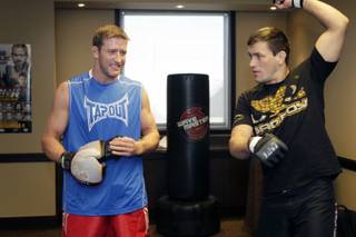 Light heavyweight fighter Stephan Bonnar, left, chats with middleweight Demian Maia as they warm up for  a media workout at the Palms Thursday, December 2, 2010. Bonnar faces Igor Pokrajac in the TUF 12 Finals at the Palms Saturday.