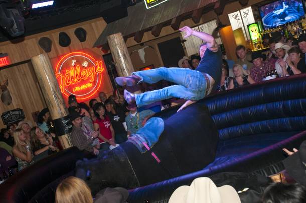 Gutsy riders take a chance at a $200 cash prize during Gilley's Toughest Cowboy Competition on Thursday, Dec. 9, 2010.

