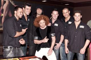Carrot Top, with Excalibur headliners Thunder From Down Under, celebrates his fifth anniversary at the Luxor on Dec. 20, 2010.