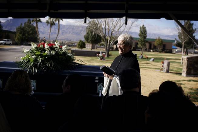 Reverend Mary Bredlau leads a funeral service for an 86-year-old woman at Palm Mortuary in North Las Vegas December 23, 2010.