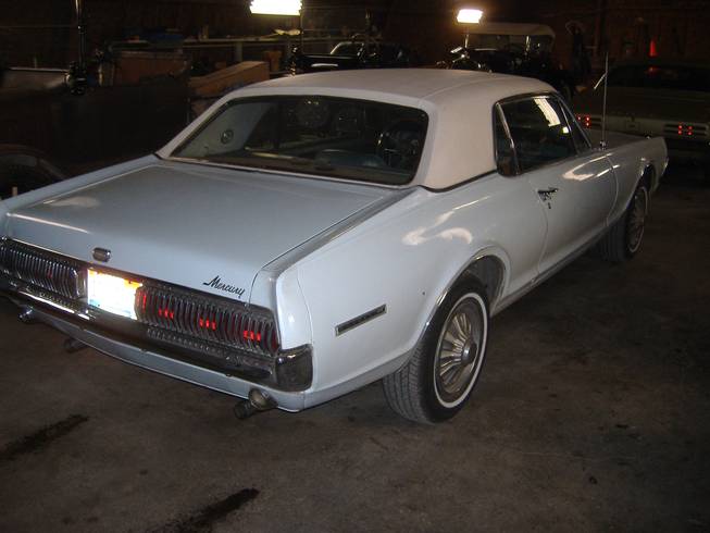 The car from the backside. The Mercury Cougar had two great body designs, in 1967 and '68. Then it went muscle and lost its charm. In the humble opinion of one former owner.