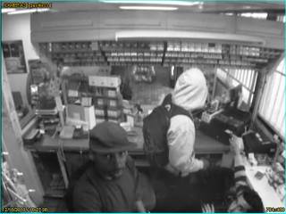 Surveillance video images of robbery suspects. 