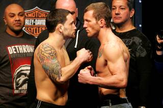 Frank Edgar (L) faces off with Gray Maynard during the weigh in for UFC 125 Friday, December 31, 2010 at the MGM Grand Garden Arena.