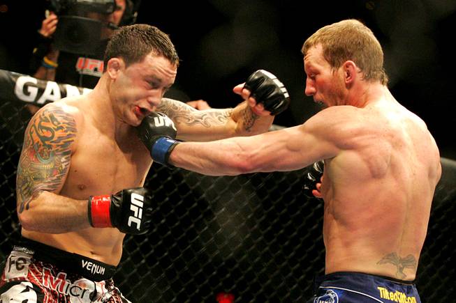 Gray Maynard tags Frankie Edgar with a left during their lightweight title fight at UFC 125 Saturday, January 1, 2011 at the MGM Grand Garden Arena. Maynard and Edgar fought to a draw.