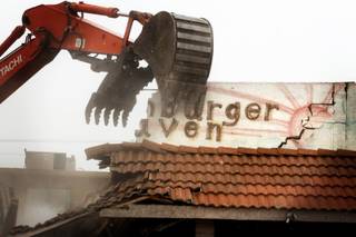 The demolition of Hamburger Heaven on the corner of E Street and Monroe Avenue in West Las Vegas Monday, January 3, 2011.