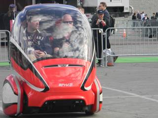 Two riders take a spin in the Jiao model of General Motors' EN-V, which made its North American public debut at the Consumer Electronics Show this week.
