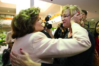 Rep. Shelley Berkley embraces Roberta Lange, 53, during the 