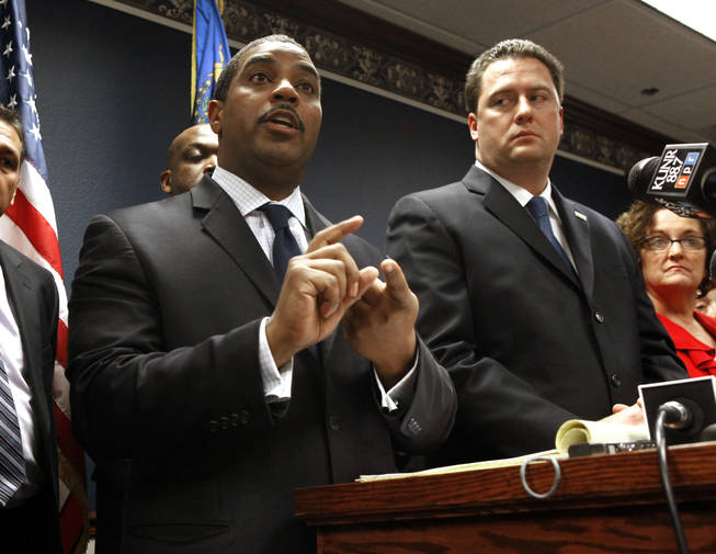 Nevada Senate Majority Leader Steven Horsford, D-North Las Vegas, left, discuses his opposition to Gov. Brian Sandoval's proposed state budget cuts during a news conference after Sandoval's State of the State address before a joint session of the Nevada Legislature in Carson City on Monday Jan. 24, 2011.  At right is Assembly Speaker-elect John Oceguera, D-Las Vegas.