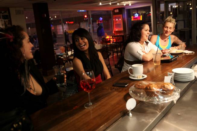 From left, Melanie Malia, 28; Alicia Sanchez, 26; Leonela Obando, 25; and Katie Gilbert, 23, spend time in downtown Las Vegas, here at the Beat Coffeehouse.
