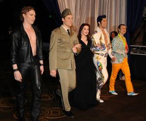 Priscilla Presley and <em>Viva Elvis</em> cast members at the Cartier VIP reception at MGM CityCenter's Crystals for Nevada Ballet Theatre's 27th Annual Black and White Ball on Jan. 29, 2011. Priscilla Presley was honored as NBT's Woman of the Year.