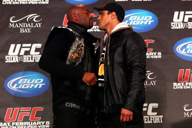Anderson Silva and Vitor Belfort face off at Mandalay Bay on Wednesday, Feb. 2, 2011, during the UFC 126 press conference.  
