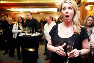 Designer Tina Enard of Reno-based Urban Design Studio reacts as she is announced the winner of the Design a Suite contest for her suite called 