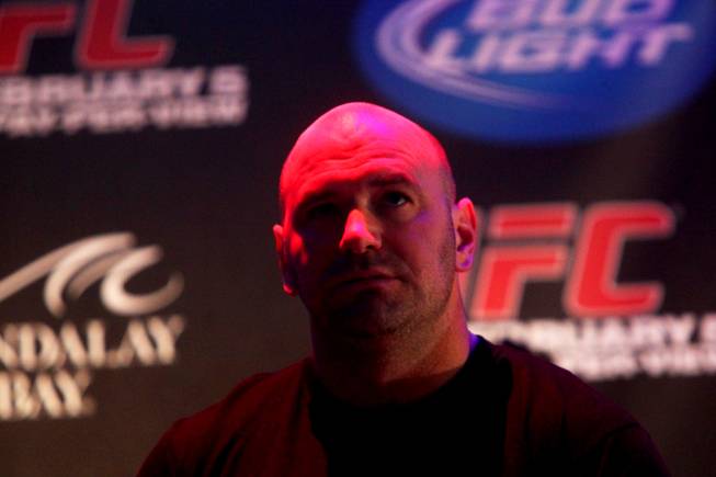 UFC President Dana White watches a video during the weigh-in for UFC 126 on Friday, Feb. 4, 2011, at Mandalay Bay Events Center.