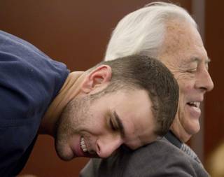 Anthony M. Carleo, left, talks with his attorney William Terry before the start of court, Monday, Feb. 7, 2011 in Las Vegas. Carleo made his first court appearance since his arrest in a dramatic heist that authorities say netted $1.5 million in casino chips from the Bellagio resort on the Las Vegas Strip. The twenty-nine-year-old was not asked to enter a plea Monday to armed robbery, assault and burglary charges in the Dec. 14 heist. A judge scheduled another hearing for Feb. 23.  