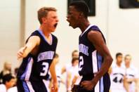Malcolm Allen (right) and Dallin Layton are fired up after Allen hit a three against Palo Verde during their game Tuesday, February 9, 2011 at Palo Verde High School. Centennial won the game 74-57.