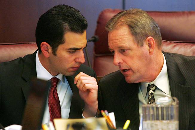 Senators Ruben Kihuen and John Lee confer during a meeting of a meeting of the Senate Select Committee on Economic Growth and Employment on the third day of the 2011 legislative session Wednesday, February 9, 2011 in Carson City.