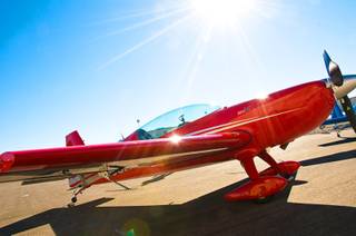 The Extra330LC aerobatic airplane, used by Air Combat Ace, sits on the tarmac before flight time Feb. 10, 2011. 